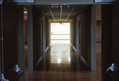 1975 photograph of Art and Architecture South during renovation. Remodeled first floor with original gym floor. Donor: Karl Roenke and Robert Weaver, 1976.