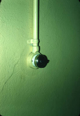 1975 photograph of Art and Architecture South during renovation. Electric light switch. Donor: Karl Roenke and Robert Weaver, 1976.