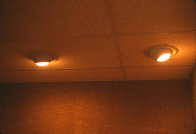1975 photograph of Art and Architecture South during renovation. Detail of ceiling light fixtures. Donor: Karl Roenke and Robert Weaver, 1976.