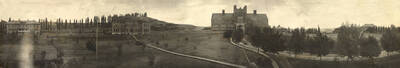 1915 panoramic photograph of university of Idaho campus. View of campus looking west, tennis courts in front of Ridenbaugh Hall on the left.