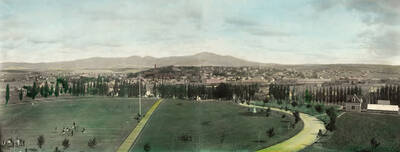 1920 panoramic hand painted photograph of University of Idaho campus. Athletic field in the foreground, Moscow Mountain in the background. Donor: Mrs. Eggan..