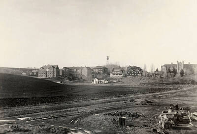 1930 panoramic photograph of University of Idaho campus. Brickyard is visible in the lower right corner.