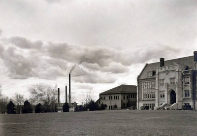 1926 panoramic photograph of University of Idaho campus. Main entrance into the Science Hall with the steam power plant stacks in the background. Donor: Biological Sciences Dept.