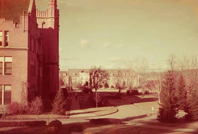 1960 color photograph of University of Idaho campus. View of Administration drive and lawn.