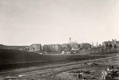 1930 panoramic photograph of University of Idaho campus. View from the brickyard to administration Building on the right and the water tower to the left.