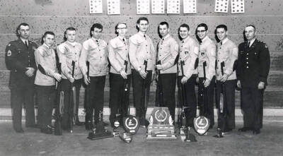 1960 photograph of Military Science Cadets. Military cadet rifle team at the shooting range. Donor: Army ROTC.