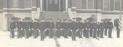 1905 photograph of Military Science Cadets. Cadet company 'B' in formation in front of old Administration building steps.
