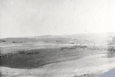 1922 photograph of Military Science Cadets. Military cadets participating in a drill at Maclean field.