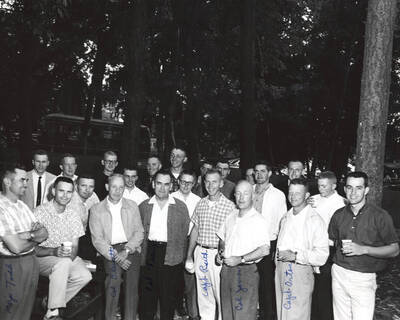 1961 photograph of Military Science Cadets. l-r: (front) Major Todd, unidentified, Col. Blewett, Col. Tracy, Capt. Ruth, Col. James, Capt. Orton, unidentified. Donor: Army ROTC.
