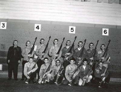 1961 photograph of Military Science Cadets. Military cadet rifle team at the shooting range. Donor: Army ROTC.