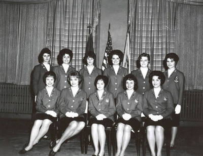 1961 photograph of Military Science Cadets. l-r: (front) Bishop, Naslund, Llewellyn, McCullough, Cook; (back) Weber, Thompson, Sharp, West, Wilson, Smith. Donor: Army ROTC.