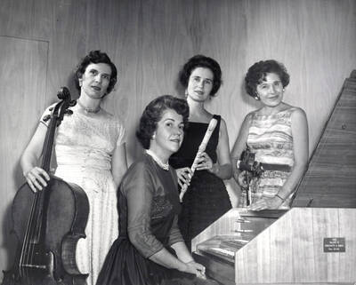 1960 photograph of Music Department. Baroque Quartet Phyllis Everest, Marian Frykman, Dvora Marcuse, and Eleanor Mader with instruments.
