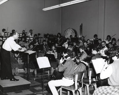 1960 photograph of Music Department. Summer school orchestra during rehearsal.