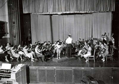 1938 photograph of Music Department. Vladimir Bakaleinikoff directs the summer school orchestra.