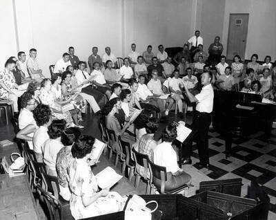 1950 photograph of Music Department. Summer school orchestra rehearsing. Donor: Publications Dept.