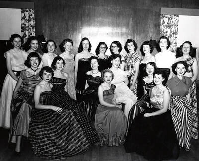 1952 photograph of Music Department. Sigma Alpha Iota, Women's Music Honorary (seated) N. Nokes, J. Raber, J. Peters, P. Rambo, E. Simons, J. Jacobs, J. Coble, J. Walser, B. Baer; (standing) R. Reynolds, N. Shelton, E. Wilcox, J. parks, M. Moline, D. Knight, A. Pickett, B. Clauser, R. Beiber, B. Schupfer, and M. Mehl. Donor: Publications Dept.
