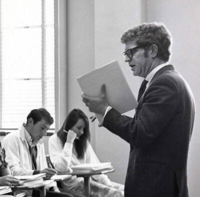 1965 photograph of Music Department. Ronald Klimko lecturing a class.