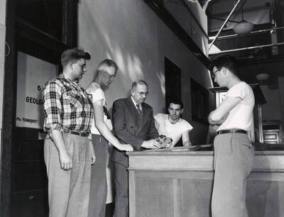 1953 photograph of College of Mines. Professor William W. Staley with students.
