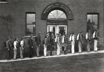 1926 photograph of College of Mines. Students in mine rescue course in front of the School of Mines Metallurgical Laboratory building.