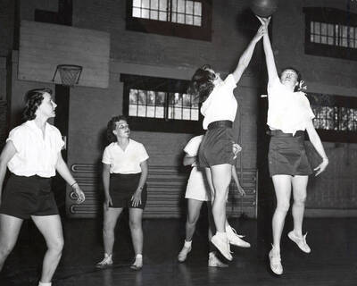 1949 photograph of Physical Education. Women's basketball. Donor: Publications Dept.