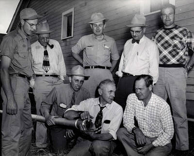 1952 photograph of Agricultural Extension Service. l-r: (front) Ed Nenmi SCS, Karl Klages, Howard Roylance; (back) Tom Brackney, Donald Theophilus?, Jim Graves, Carol Youngstrom, Walt McPherson. Donor: Robert McDole.
