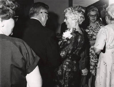 1964 photograph of Agricultural Extension Service. One of three photos of the retirement gathering for Florence M. Schultz Donor: University of Idaho Cooperative Extension System.