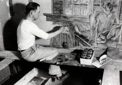 1936 photograph of Art and Architecture. Francis Newton frescoing a wall. Donor: Publications Dept.