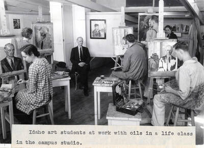 1942 photograph of Art and Architecture. Students painting during a life study class. Donor: Publications Dept.