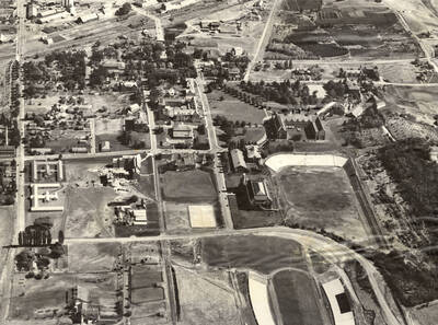 1938 photograph of University of Idaho campus. Aerial view shows both the baseball diamond and Neale Stadium.