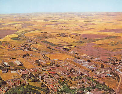 1960 photograph of University of Idaho campus. A color aerial view shows surrounding farm fields.