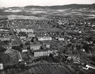 1931 photograph of University of Idaho campus. Aerial view shows both campus and Moscow.
