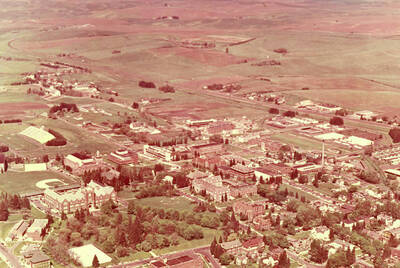 1950 photograph of University of Idaho campus. A color aerial view shows surrounding farm fields.
