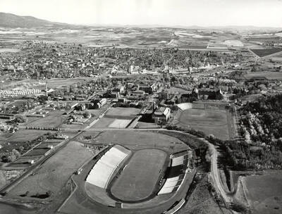 1948 photograph of University of Idaho campus. Aerial view shows Neale Stadium and grandstands.