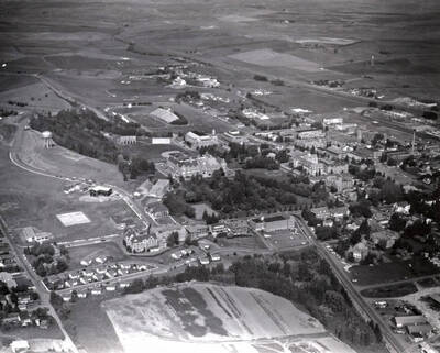 1962 photograph of University of Idaho campus. Aerial view shows both the baseball diamond and Neale Stadium.