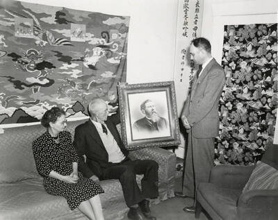1965 photograph of Gifts. l-r: Mrs. Ben Bush, E.T. McConnell, Boyd A. Martin. Donor: Publications Dept.