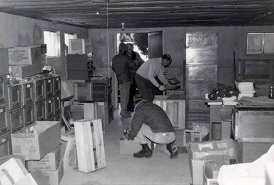 1983-11-23 photograph of Gifts. l-r: Keith Petersen, Bob Hook, Paul Tobin, Richard Beck. Donor: Potlatch Corporation, Lewiston.