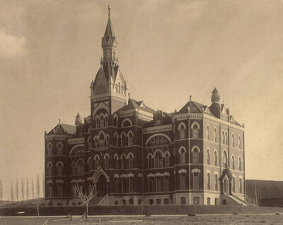 1905 photograph of Administration Building. View of the old Administration and lawn.