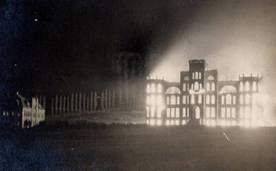 1906-03-32 photograph of Administration Building. View of the old Administration building on fire. Donor: Cleone T. Berry.