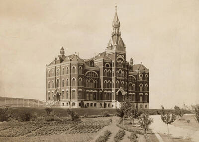 1900 photograph of Administration Building. View of the old Administration and lawn. Donor: Ruth Gipson Plowhead.