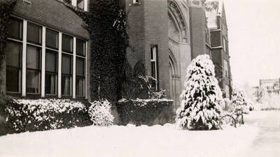 1955 photograph of Administration Building. View of winter. Donor: University Press of Idaho.
