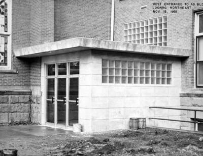 1951-11-15 photograph of Administration Building. View of the west entrance looking northeast.
