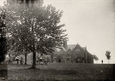 1926 photograph of Administration Building. View of University of Idaho Cannons on lawn.