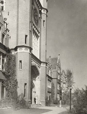 1922 photograph of Administration Building. View of students in the entryway.