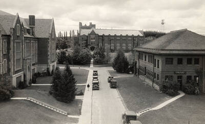 1938 photograph of Administration Building. View of Administration from road between Science and Mines.