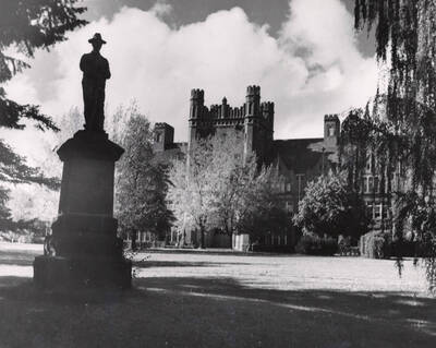 1948 photograph of Administration Building. View of Spanish-American War Memorial statue.