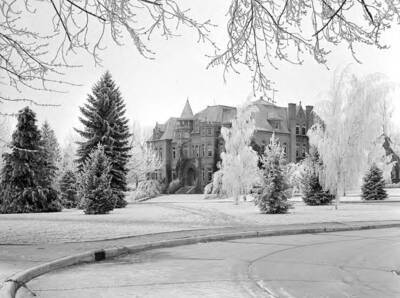 1945 photograph of Engineering Building. View of winter scene.