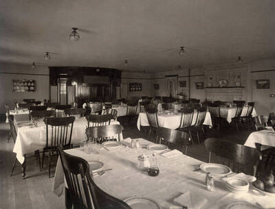 1908 photograph of Ridenbaugh Hall. View of the dining room.
