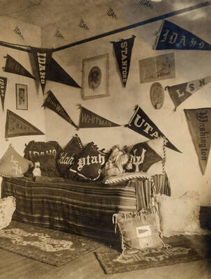 1909 photograph of Ridenbaugh Hall. View of a student's room.