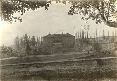 1915 photograph of Ridenbaugh Hall. View from the Administration lawn. Donor: Don R. Besse.