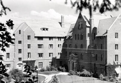 1936 photograph of Hays Hall. View of the landscape.
